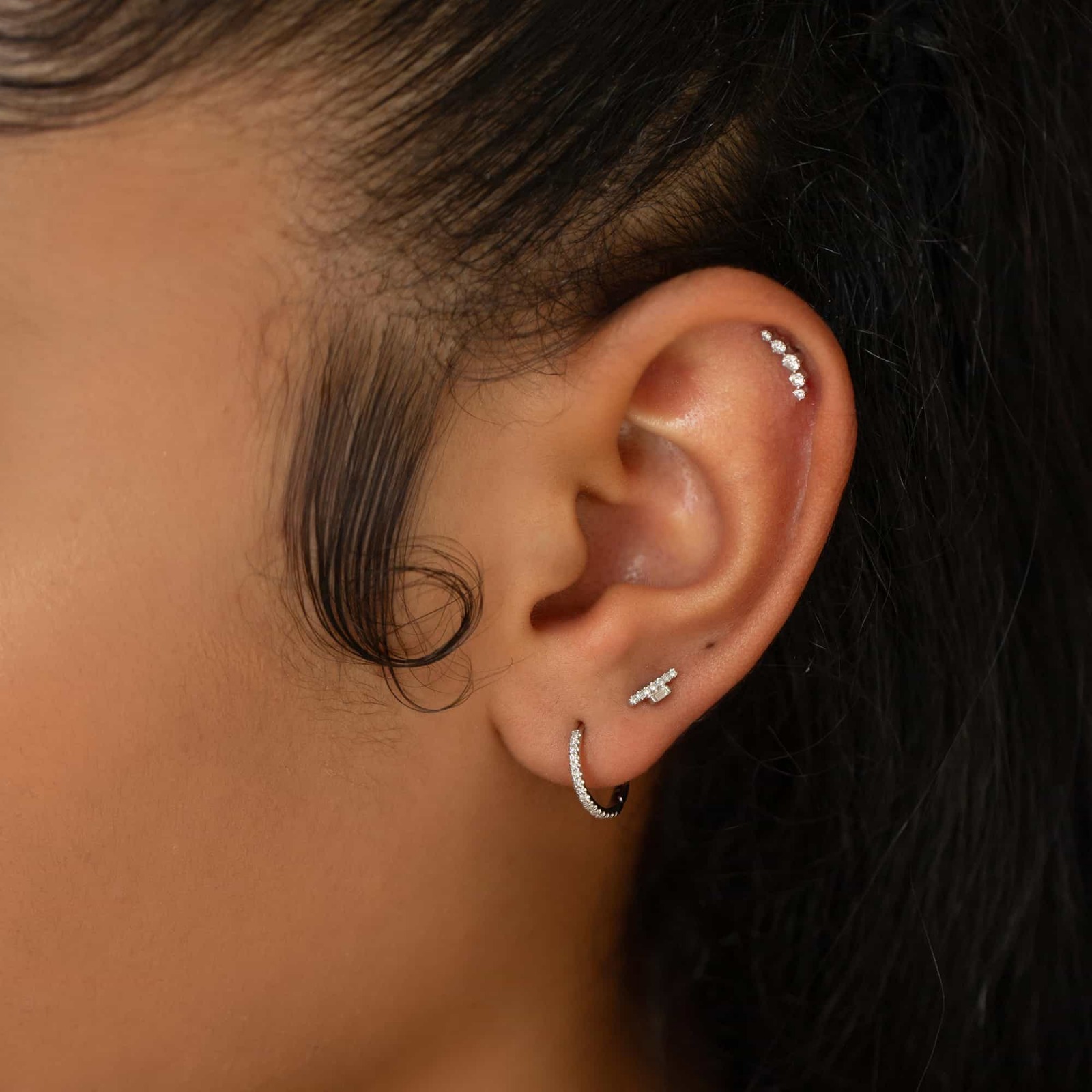 Curated Ear Piercing: Swiss Smart Luxury Styling by Cervin Blanc
