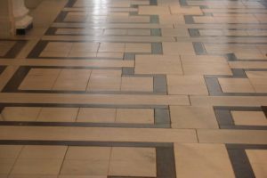 a stone floor in a building, stone flooring with texture
